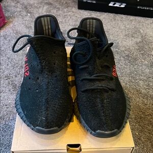 Yeezy Black and Red Athletic Shoes with Knitted Upper and Thick Sole